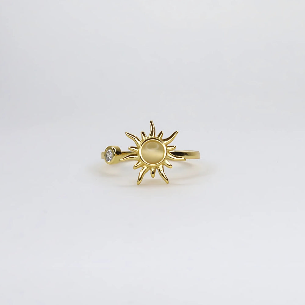 Spinning sun fidget ring