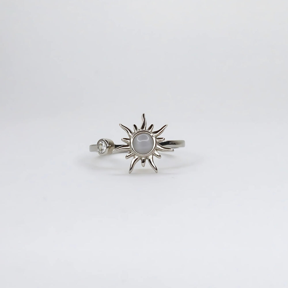 Spinning sun fidget ring